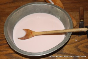 After the juice has been added to the boiled cream for the receipt (recipe) Strawberry Cream give it a stir round and when 'tis cold use it.