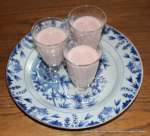 The 1744 receipt (recipe) Strawberry Cream ready to be served in hand-blown reproduction glassware. Strain out the Juice of a Pint of Strawberries, put to it a little Orange-flower Water, and Five ounces of Sugar; then boil a Pint of Cream, and put your Juice to it; give it a stir round, and then put it in your Bason, and when 'tis cold use it.