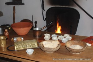 This is the hearth table set for the 1717 receipt (recipe) Cheese Loaves.  The primary ingredients are fresh cheese curd and grated bread.