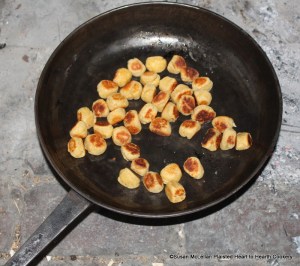 After the butter was clarified and heated for the receipt (recipe) Fritters in the Italian Fashion the balls were fried. It was a challenge to move the balls as big as a nutmeg or musket a musket to have them evenly cooked.