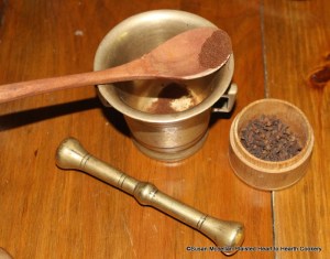 After the saffron has been infused in the cream for the receipt (recipe) Fritters in the Italian Fashion take some cloves.  The cloves were processed in a brass mortar and pestle.