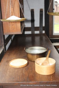 For the next receipt (recipe) Too Dry Churrys (G. Penn 1702 transcribed manuscript), take one pound of Lofe suger.  Since I am preparing one-quarter of the receipt, I am weighing on the balance scales one quarter of a pound of sugar.  