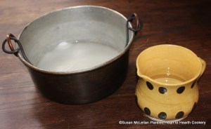 After the sugar has been weighed for the receipt (recipe) Too Dry Churrys wett it into a syrup.  Only enough water is added to dissolve the sugar so it is added slowly.