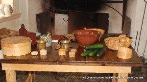 The next receipt (recipe) is from The Art of Cookery made Plain and Easy by a Lady, H. Glasse, To stew Cucumbers.  Pictured is the work table for preparing the receipt.