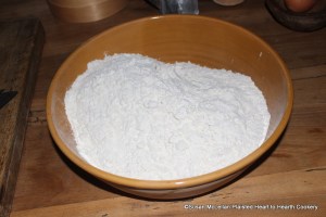 This next receipt (recipe) To make Cinamon Bisket is from a 17th century manuscript receipt book.  The first step is to take halfe A peck of fine flower.  I made one third of the receipt so pictured is one third of a peck of flour.