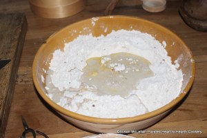 After the eggs have been added to the flour, cinnamon, cardamon seed and anise seed mixture for the receipt (recipe) To make Cinamon Bisket add 3 spoonfuls of Ale yeast.